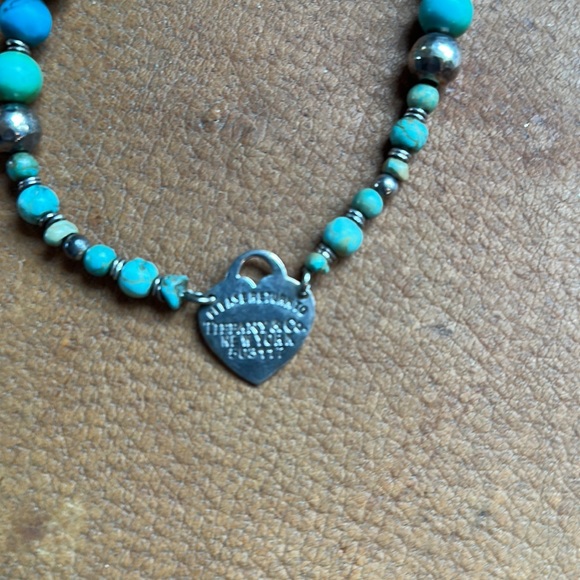 Necklace and bracelet set. Has a Tiffany and Company charm. - Picture 3 of 9